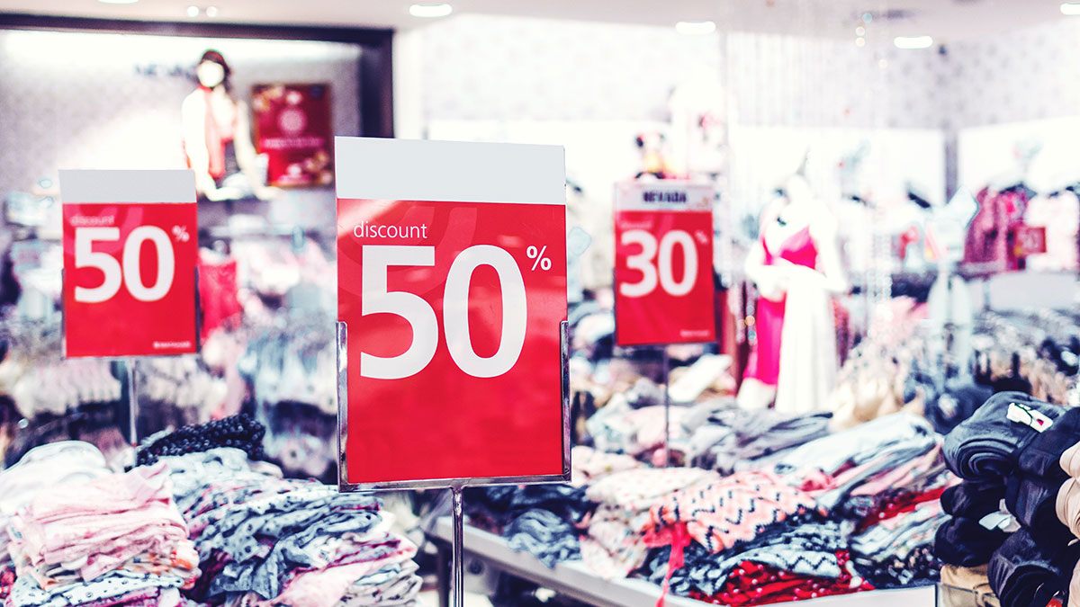 Saving Money at a Clothing Store Discount Signs